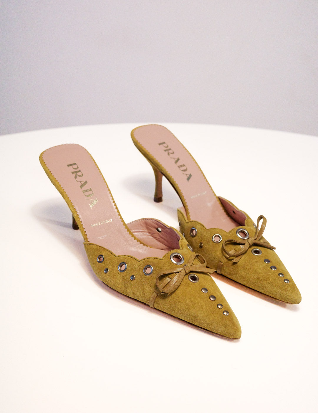 Prada Ochre Suede Grommet Mules | 37