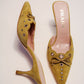 Prada Ochre Suede Grommet Mules | 37