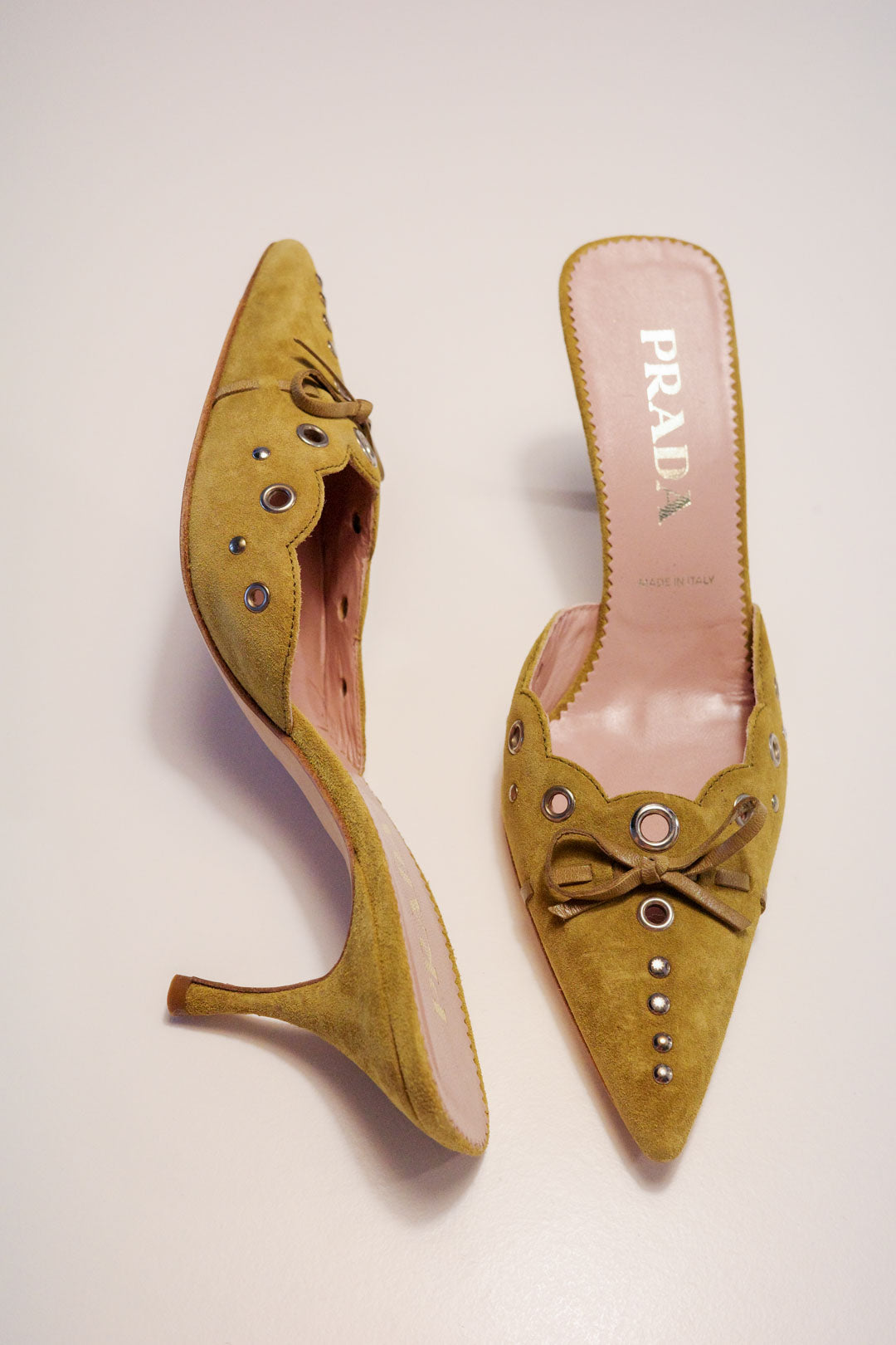Prada Ochre Suede Grommet Mules | 37